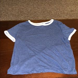 Blue shirt with white on the edges